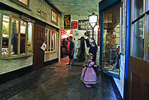 Replica shop fronts line the courtyard